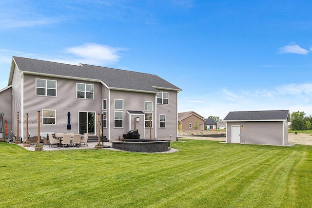 650 W Silverleaf Ct, Plover, WI 54467 - rear view of house featuring a patio area, a lawn, and an outdoor structure