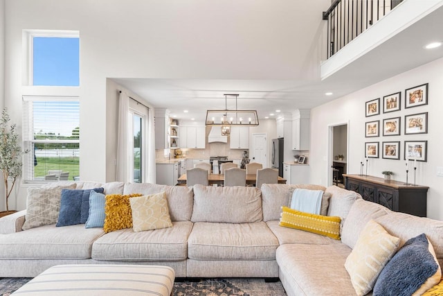 650 W Silverleaf Ct, Plover, WI 54467 - living room featuring a towering ceiling and recessed lighting