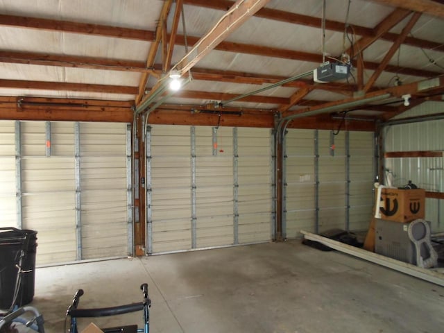 212 E Bowen St, Brandon, WI 53919 - garage featuring a garage door opener