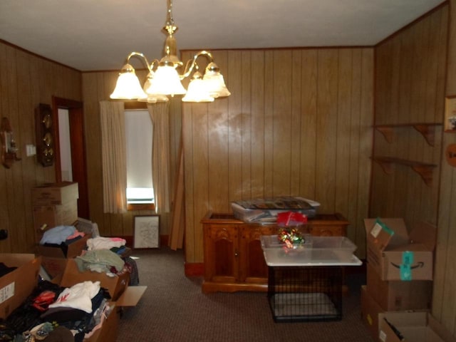 212 E Bowen St, Brandon, WI 53919 - carpeted dining room featuring a chandelier and wooden walls
