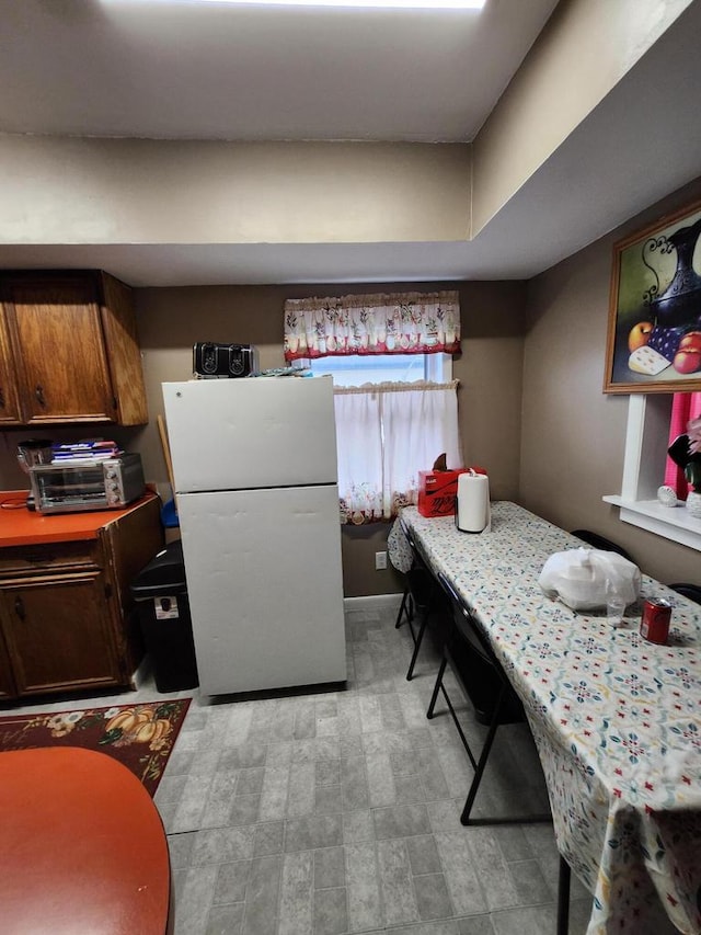 1535 W Lincoln Ave, Milwaukee, WI 53215 - kitchen with freestanding refrigerator