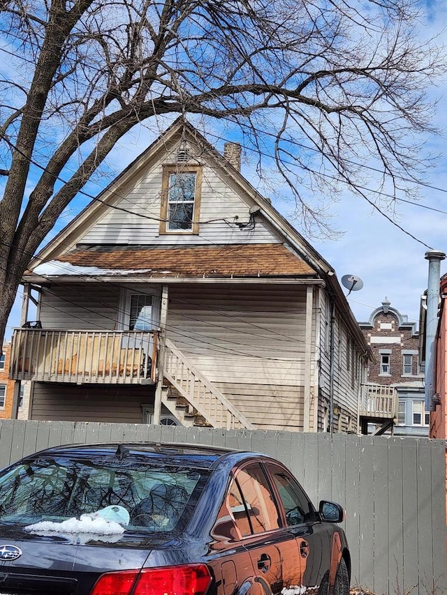 1535 W Lincoln Ave, Milwaukee, WI 53215 - view of home's exterior with stairs and a chimney