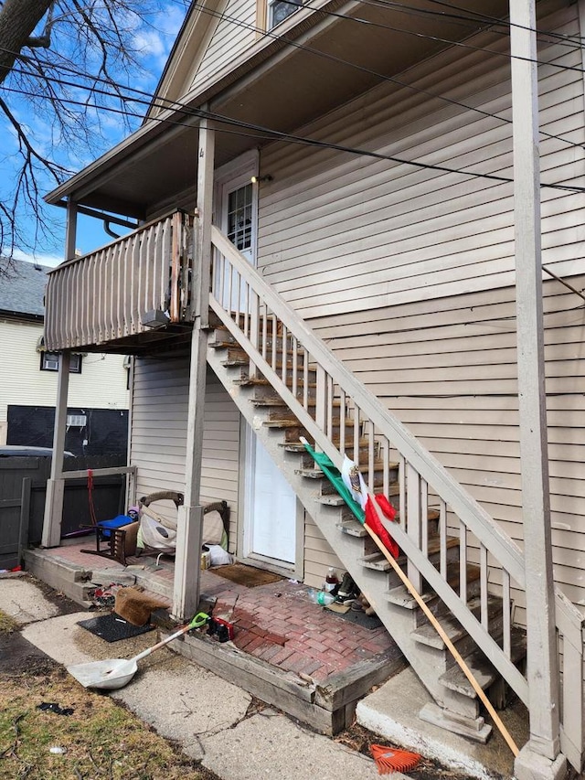 1535 W Lincoln Ave, Milwaukee, WI 53215 - view of home's exterior with stairway and a patio