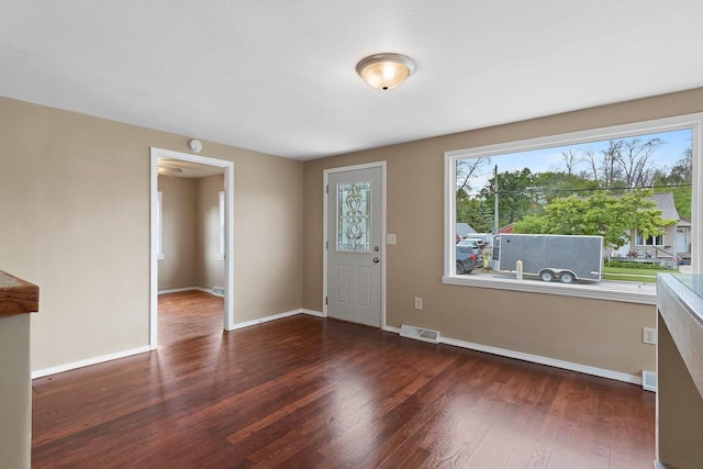 2717 13th St, Two Rivers, WI 54241 - foyer with healthy amount of natural light and wood finished floors
