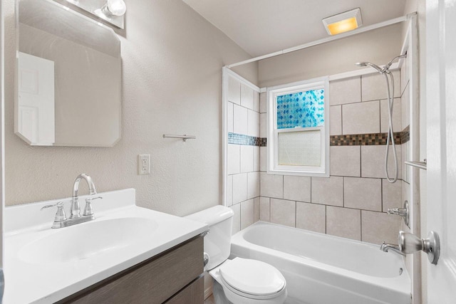 2717 13th St, Two Rivers, WI 54241 - bathroom with vanity, shower / tub combination, and a textured wall