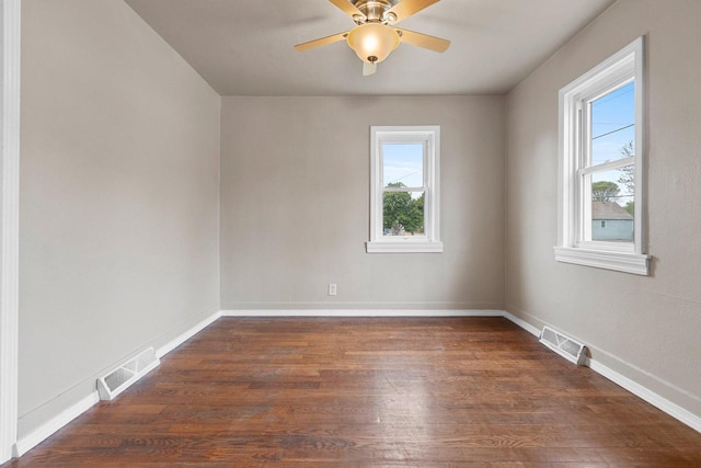 2717 13th St, Two Rivers, WI 54241 - unfurnished room with dark wood-type flooring and ceiling fan