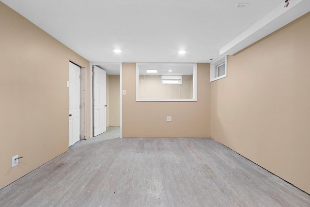 2717 13th St, Two Rivers, WI 54241 - below grade area featuring wood finished floors and recessed lighting