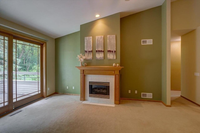 3 Deer Point Trl, Madison, WI 53719 - unfurnished living room with carpet flooring, a fireplace, and recessed lighting