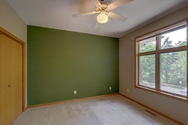 3 Deer Point Trl, Madison, WI 53719 - empty room with light colored carpet and ceiling fan