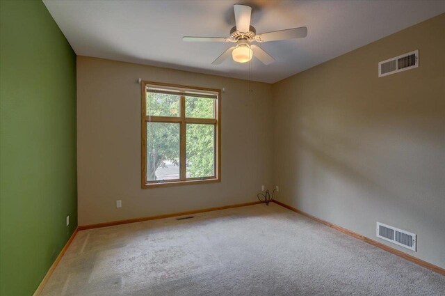 3 Deer Point Trl, Madison, WI 53719 - carpeted spare room featuring baseboards and ceiling fan