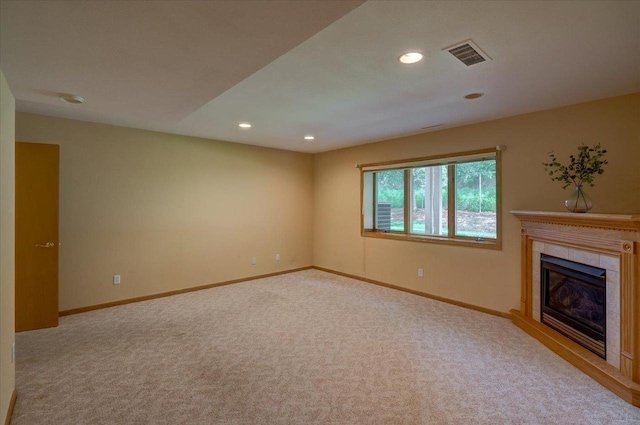 3 Deer Point Trl, Madison, WI 53719 - unfurnished living room with carpet, recessed lighting, and a tiled fireplace