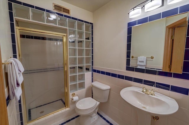 3 Deer Point Trl, Madison, WI 53719 - bathroom featuring a stall shower and tile walls