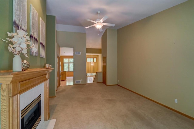 3 Deer Point Trl, Madison, WI 53719 - living room with ceiling fan, light colored carpet, and a tile fireplace