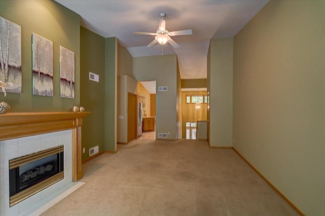 3 Deer Point Trl, Madison, WI 53719 - unfurnished living room featuring a ceiling fan, a fireplace, carpet floors, and lofted ceiling