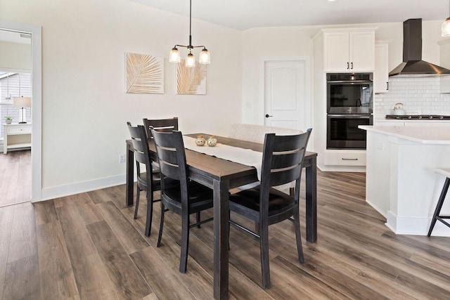 1386 Overlook Cir, Hartland, WI 53029 - dining space with dark wood-type flooring and a chandelier