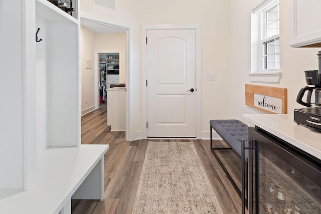 1386 Overlook Cir, Hartland, WI 53029 - mudroom with wine cooler and wood finished floors
