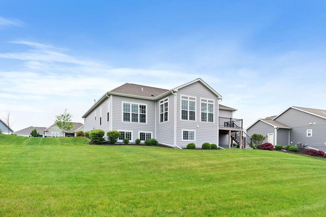 1386 Overlook Cir, Hartland, WI 53029 - back of house featuring stairs, a lawn, and a deck
