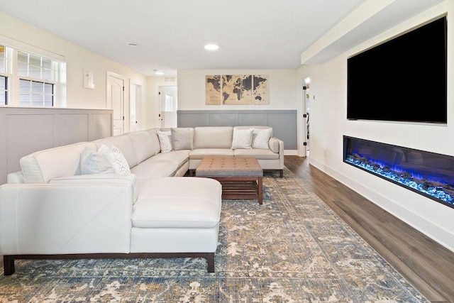 1386 Overlook Cir, Hartland, WI 53029 - living room with wood finished floors, recessed lighting, and a glass covered fireplace