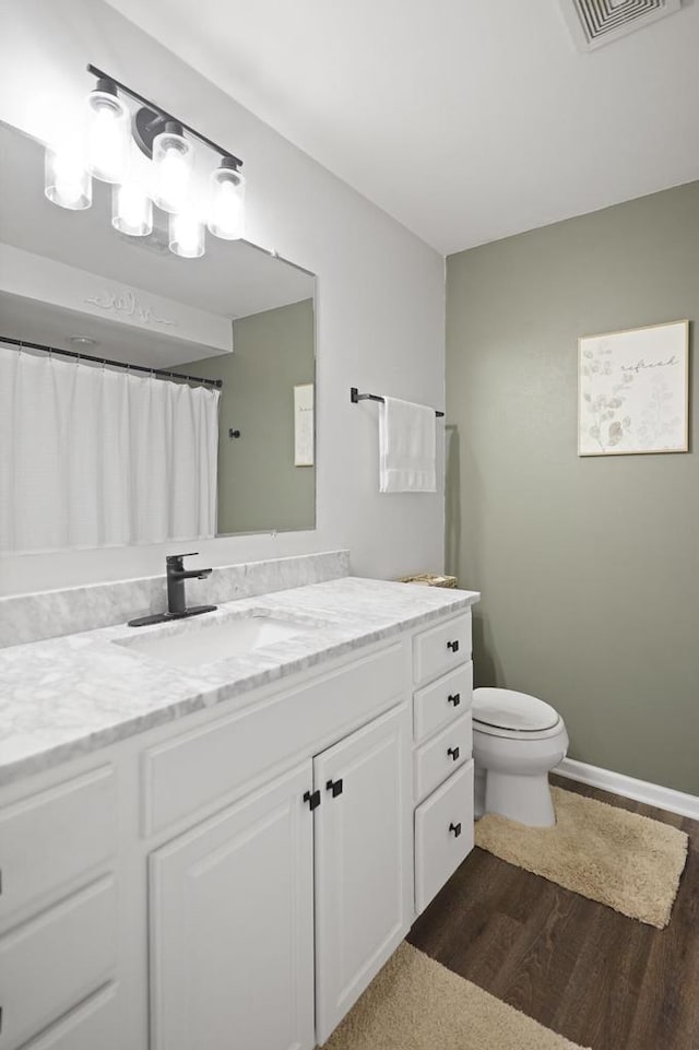 3223 55th Ct Unit 65, Kenosha, WI 53144 - full bath featuring wood finished floors, vanity, and a shower with curtain