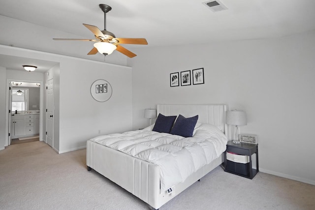 3223 55th Ct Unit 65, Kenosha, WI 53144 - carpeted bedroom featuring a ceiling fan and ensuite bath