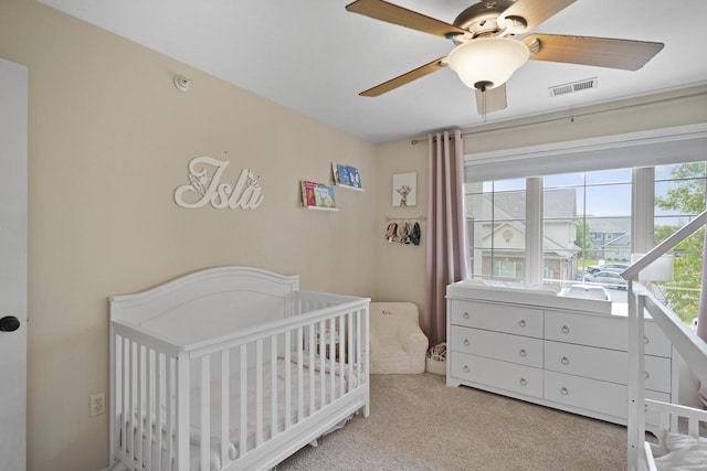 3223 55th Ct Unit 65, Kenosha, WI 53144 - carpeted bedroom with a nursery area and a ceiling fan
