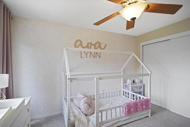 3223 55th Ct Unit 65, Kenosha, WI 53144 - carpeted bedroom featuring wallpapered walls, a ceiling fan, and a closet