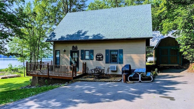 W6741 Lakewood Blvd, Ladysmith, WI 54848 - view of front of home featuring a shed and a deck