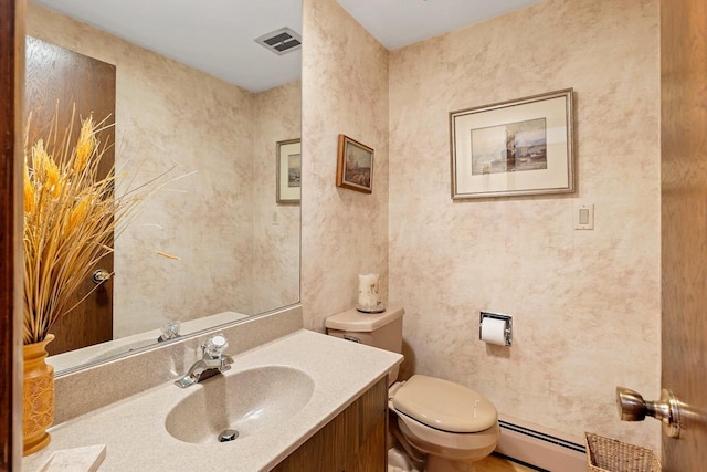 1225 W Cedar St, Appleton, WI 54914 - bathroom featuring baseboard heating and vanity