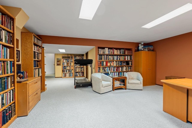 1225 W Cedar St, Appleton, WI 54914 - living area featuring wall of books, carpet flooring, and built in features