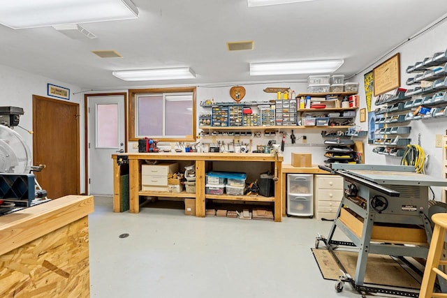 1225 W Cedar St, Appleton, WI 54914 - misc room with a workshop area and finished concrete floors