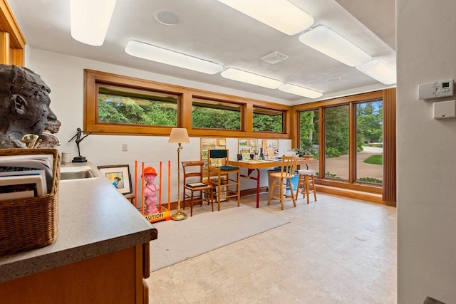 1225 W Cedar St, Appleton, WI 54914 - dining space featuring a desk and light flooring