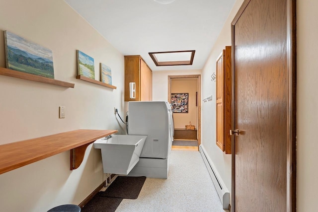 1225 W Cedar St, Appleton, WI 54914 - hall with baseboard heating and washer / clothes dryer