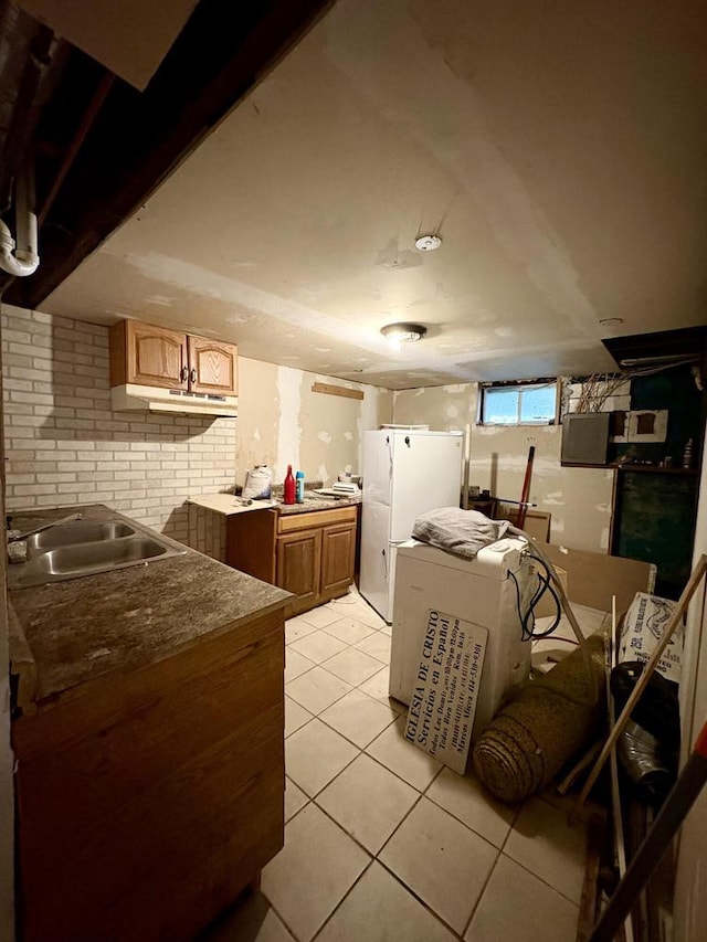 4110 N 7th St, Milwaukee, WI 53209 - kitchen with freestanding refrigerator and light tile patterned floors