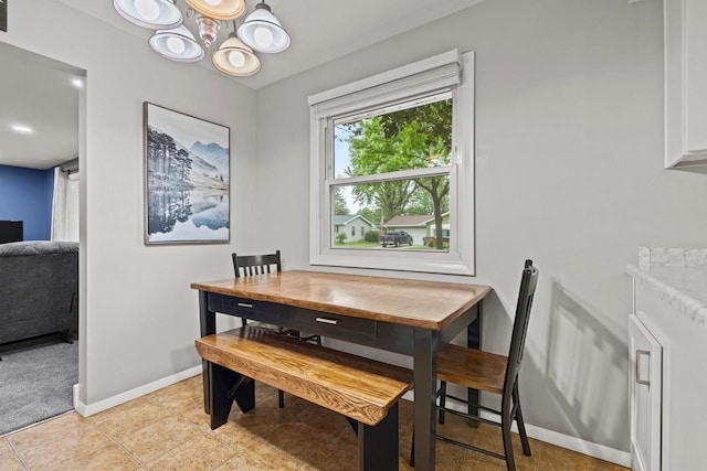 931 W Lindbergh St, Appleton, WI 54914 - dining space featuring a chandelier and baseboards