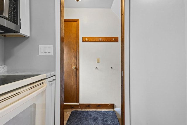 931 W Lindbergh St, Appleton, WI 54914 - kitchen with stainless steel microwave, range, and light countertops