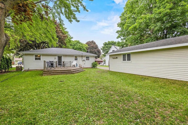 931 W Lindbergh St, Appleton, WI 54914 - rear view of property featuring a wooden deck and a yard