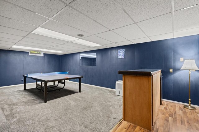 931 W Lindbergh St, Appleton, WI 54914 - playroom with a paneled ceiling, wood finished floors, and a bar