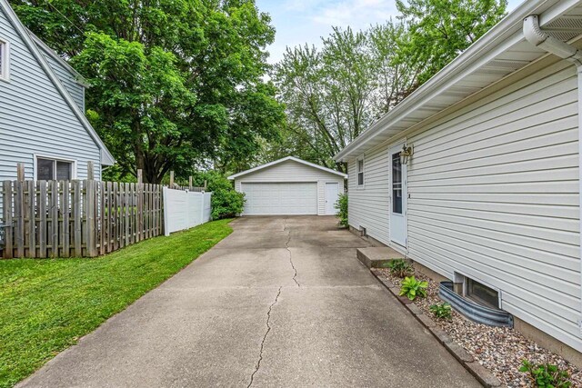 931 W Lindbergh St, Appleton, WI 54914 - view of patio with a detached garage and an outbuilding