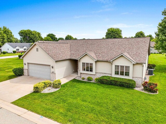52 Penbrook Cir Unit 47, Appleton, WI 54911 - ranch-style house with an attached garage, a front lawn, driveway, and brick siding