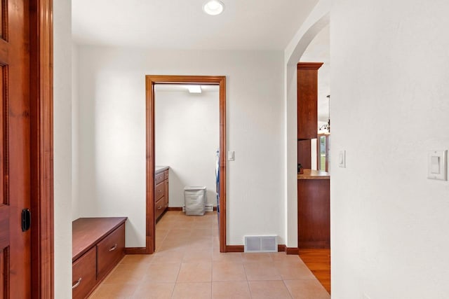 52 Penbrook Cir Unit 47, Appleton, WI 54911 - corridor with arched walkways and light tile patterned floors