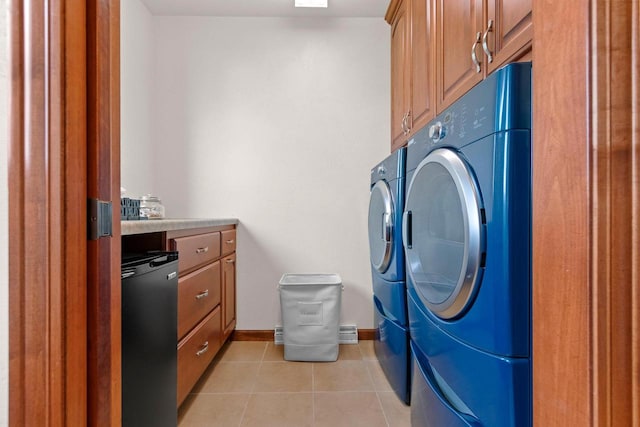 52 Penbrook Cir Unit 47, Appleton, WI 54911 - laundry room featuring cabinet space, separate washer and dryer, and light tile patterned floors