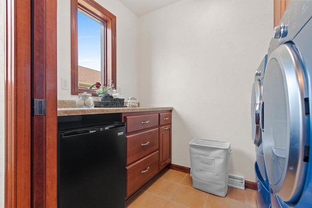 52 Penbrook Cir Unit 47, Appleton, WI 54911 - laundry room featuring light tile patterned floors and separate washer and dryer