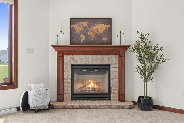 52 Penbrook Cir Unit 47, Appleton, WI 54911 - detailed view of carpet floors, a baseboard heating unit, and a brick fireplace