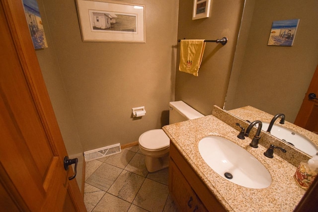 1135 W Walworth Ave, Whitewater, WI 53190 - half bathroom with tile patterned flooring and vanity
