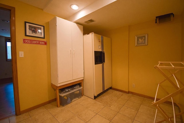 1135 W Walworth Ave, Whitewater, WI 53190 - kitchen with white refrigerator with ice dispenser and white cabinets