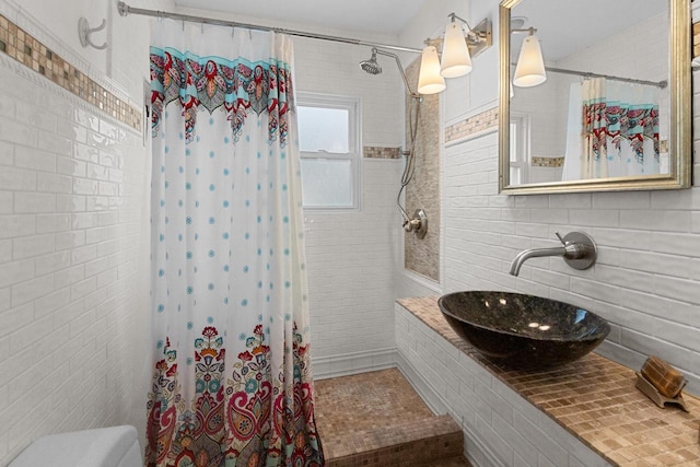 8823 406th Ave, Genoa City, WI 53128 - bathroom with a tile shower and tile walls