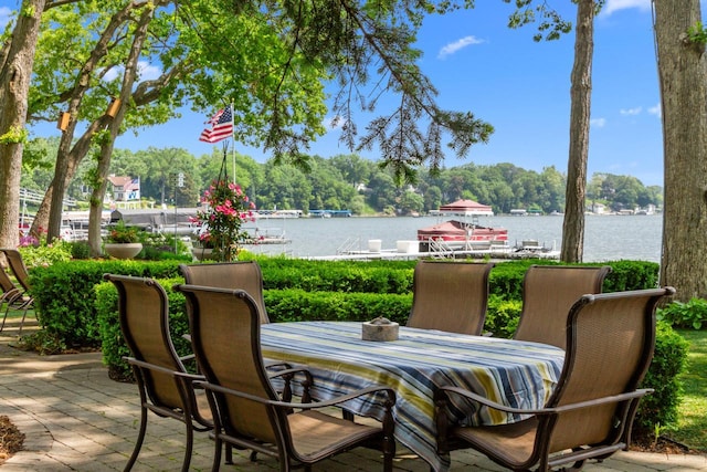 8823 406th Ave, Genoa City, WI 53128 - deck with a water view, outdoor dining area, and a patio