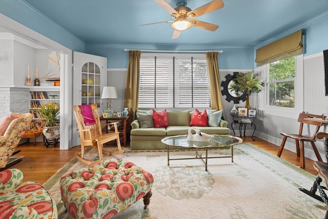 8823 406th Ave, Genoa City, WI 53128 - living area featuring a ceiling fan, wood finished floors, and crown molding