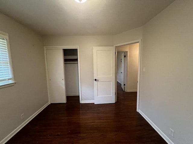 3668 S 79th St, Milwaukee, WI 53220 - unfurnished bedroom featuring wood finished floors and a closet