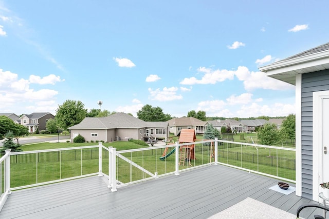 4790 Innovation Dr, Deforest, WI 53532 - deck featuring a playground, a residential view, and a yard